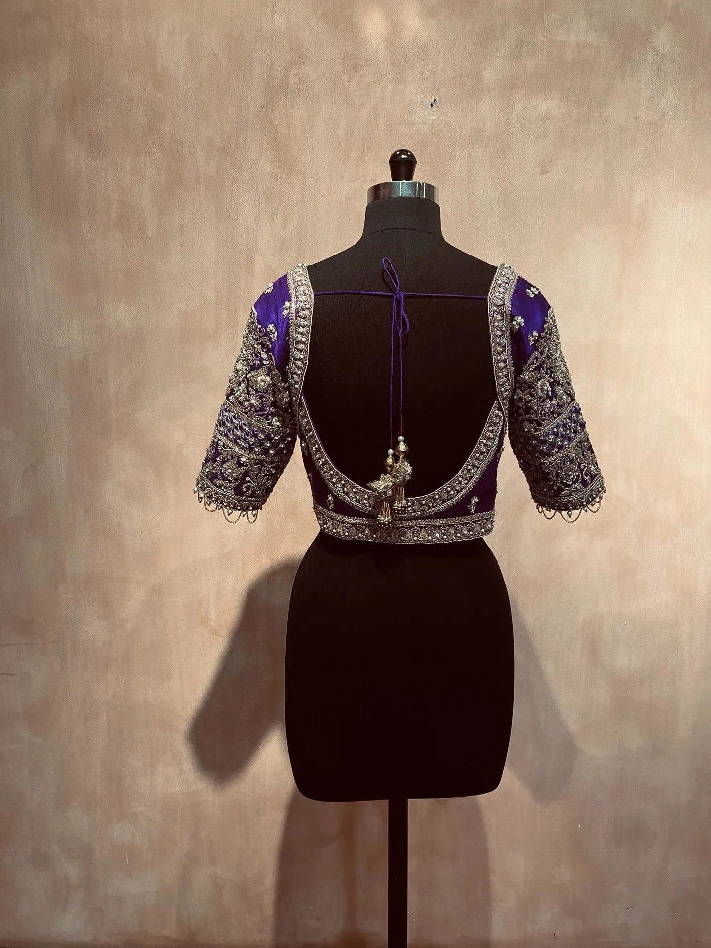 Elegant purple intricate sleeve blouse