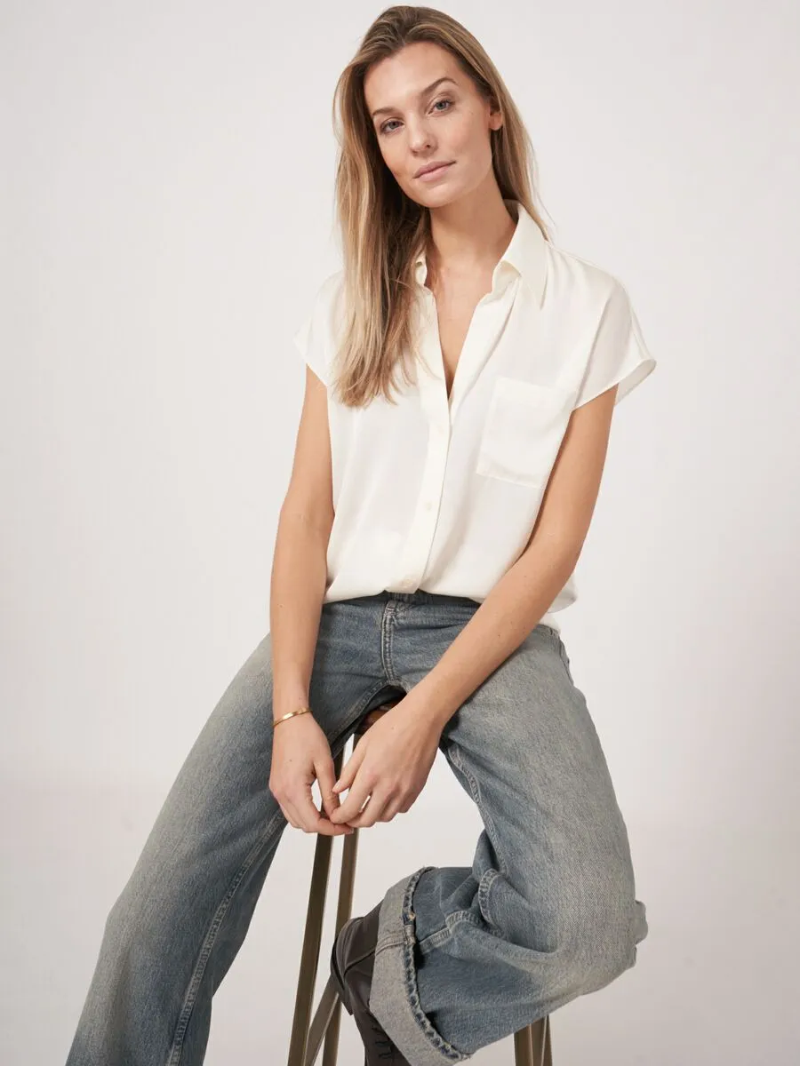 Sleeveless silk blouse with chest pocket